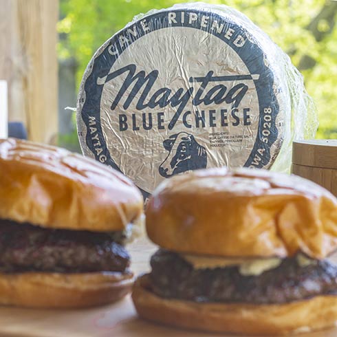 Maytag Blue Cheese Wheel with peanut butter, blue cheese and bacon jam burgers